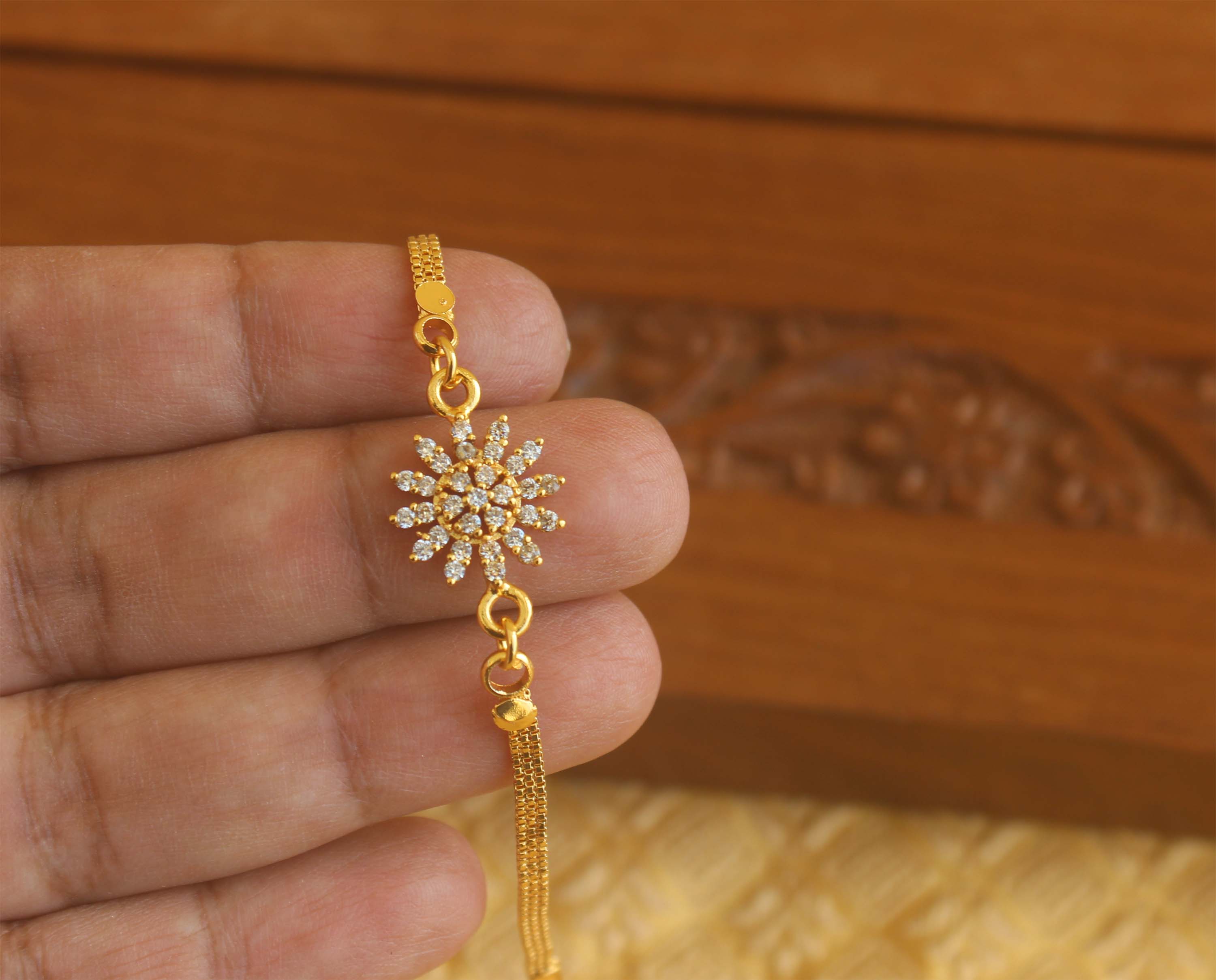 Designer Gold plated hand chain Tanvi46