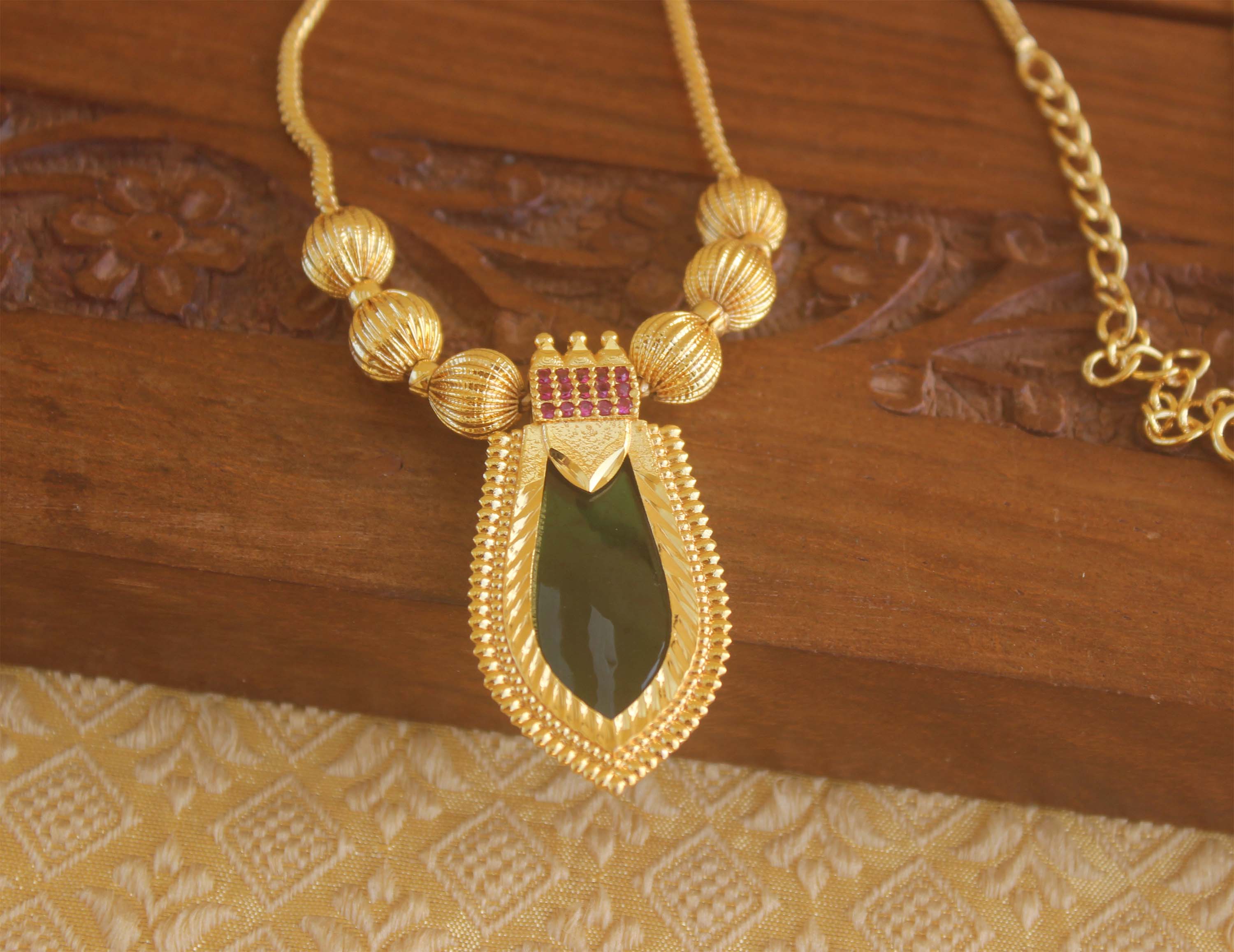 Designer palakka gold plated necklace Tanvi79